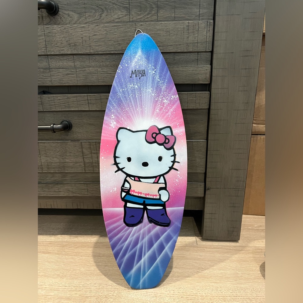 Spraying Hello Kitty Wooded board “Maya “ is on top